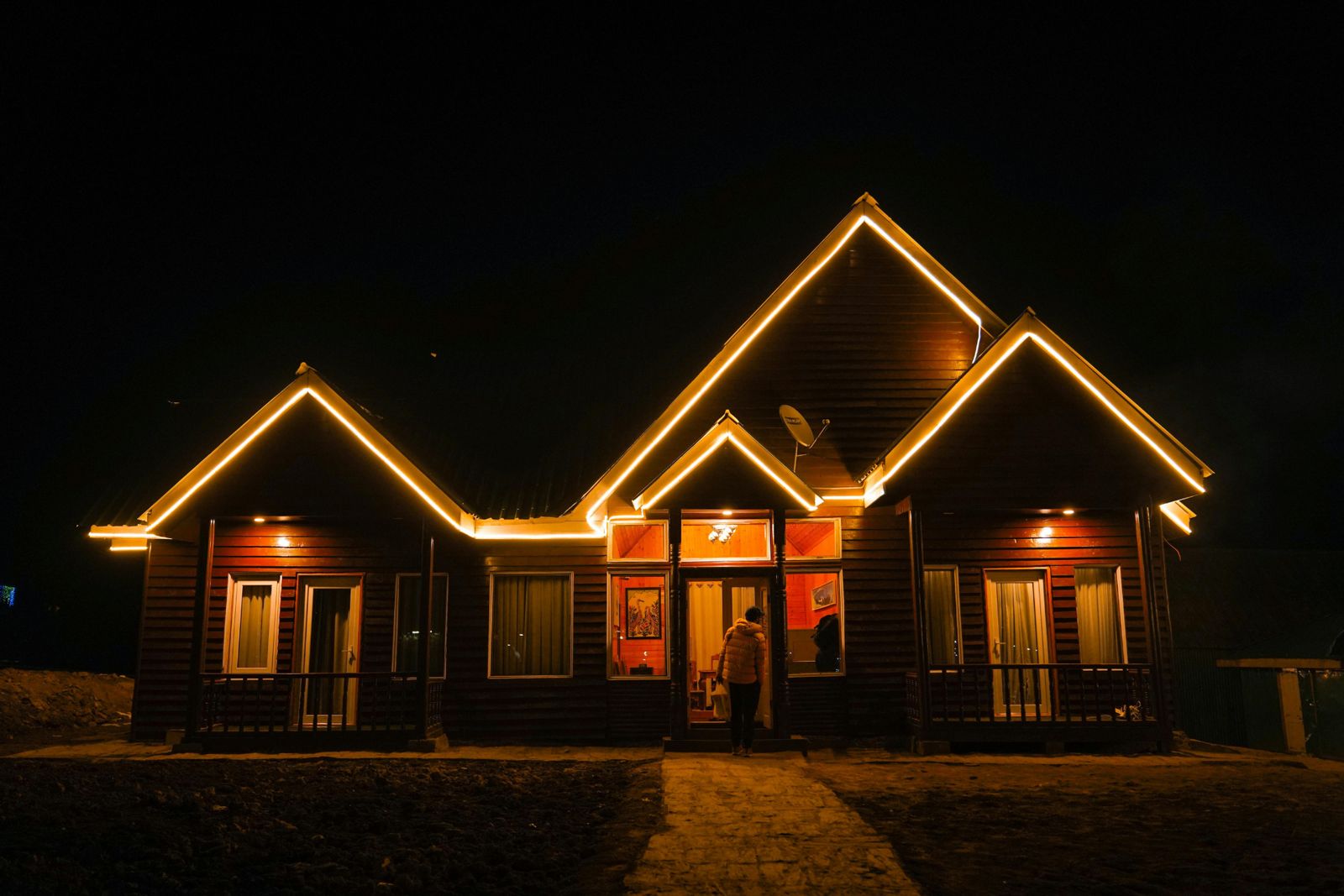 Warm white accent lighting on gables